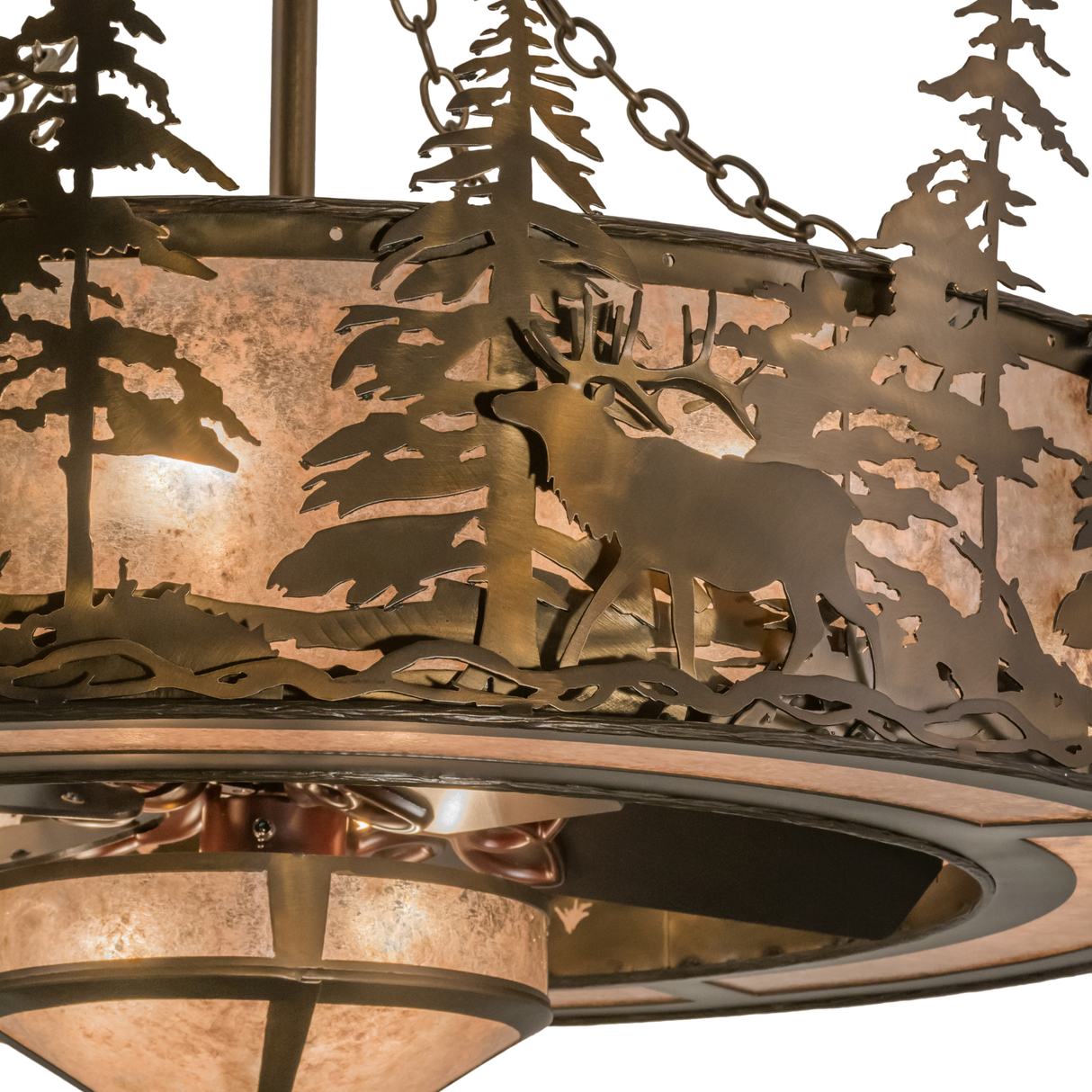 Closeup of elk and pine tree detailing with warm amber mica illumination.