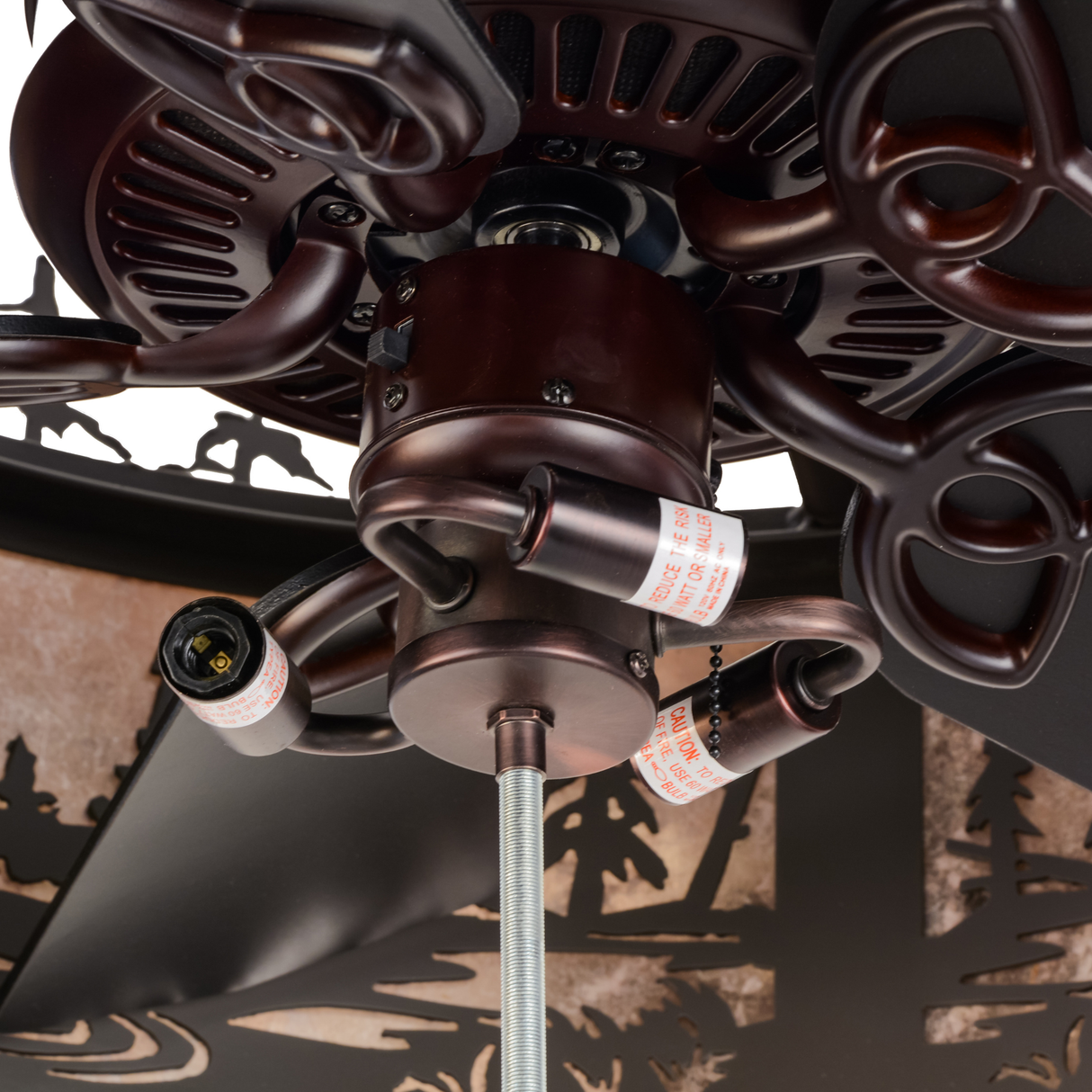 Closeup view of fan motor and bulb sockets detail.