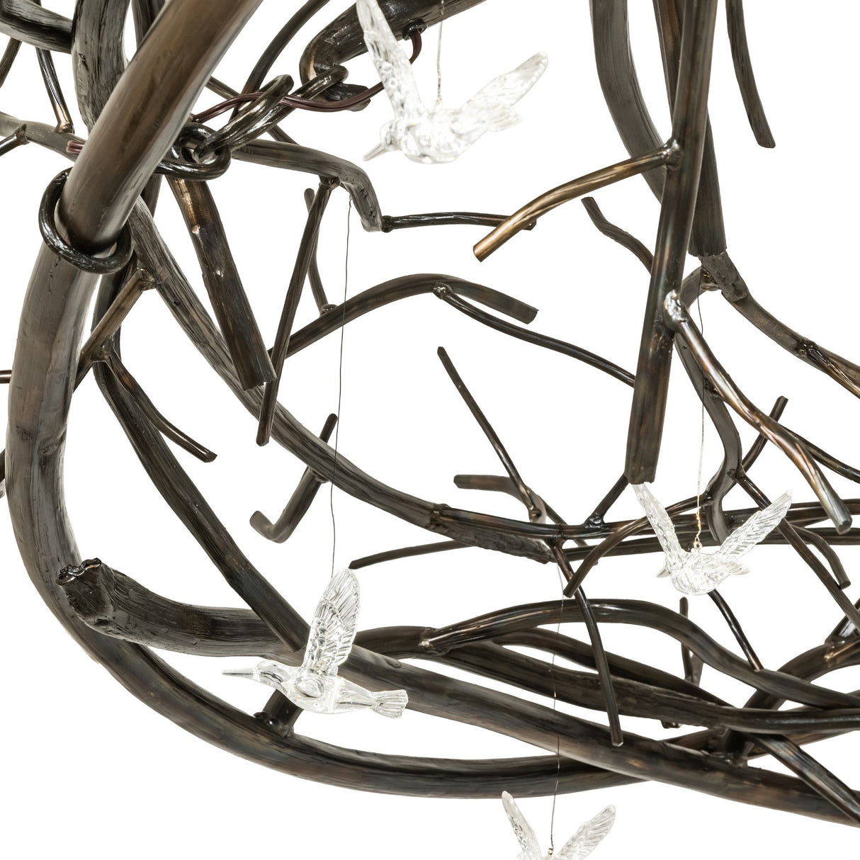 Close-up of twisted metal branches on Gardner chandelier.