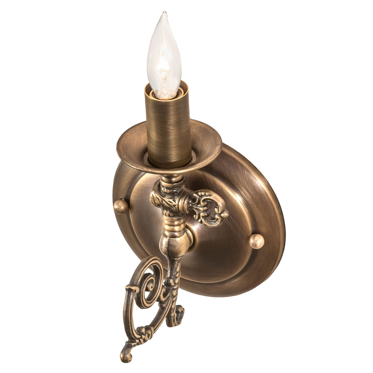 Overhead view of antique brass wall sconce showing circular base.