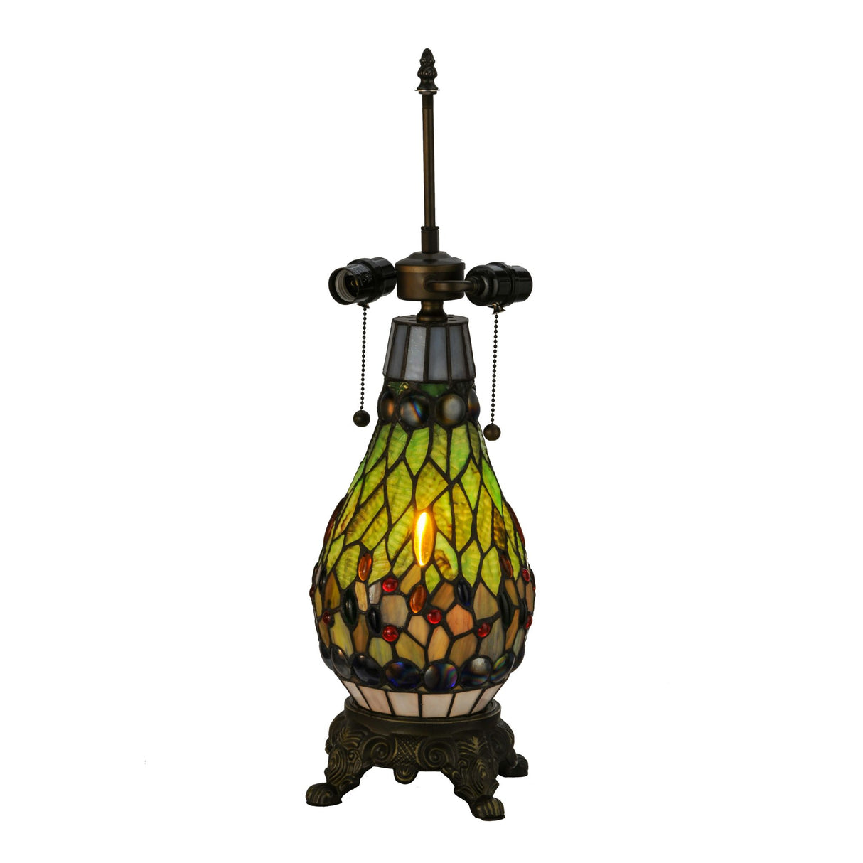Close-up of Tiffany lamp base with stained glass detailing.