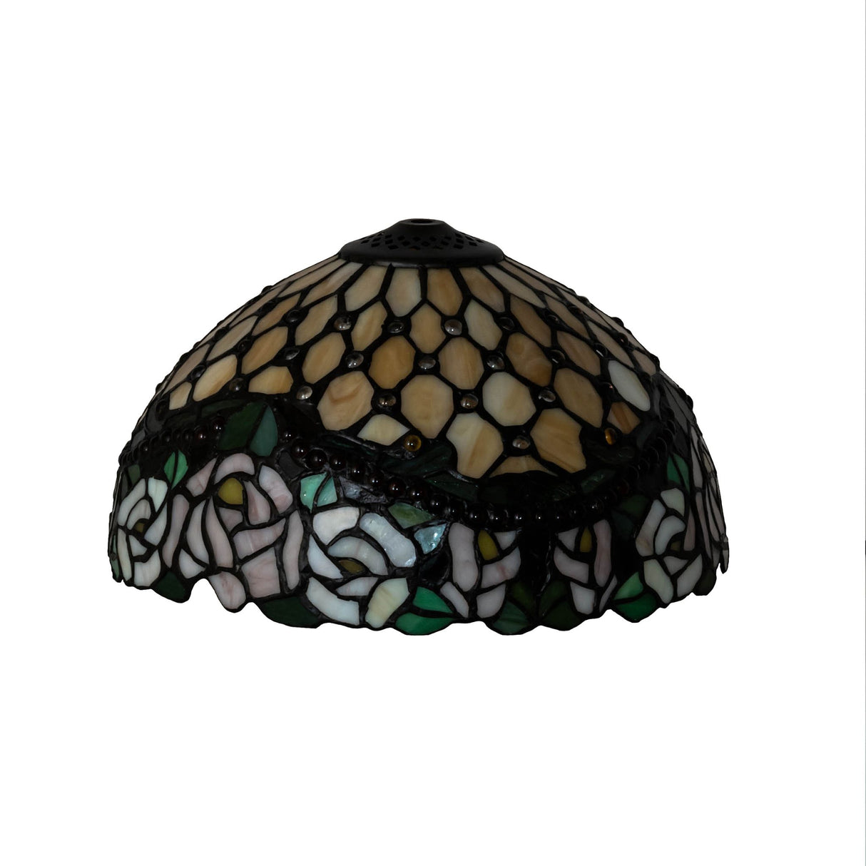 Dimly lit Jeweled Rose shade featuring intricate floral glasswork.