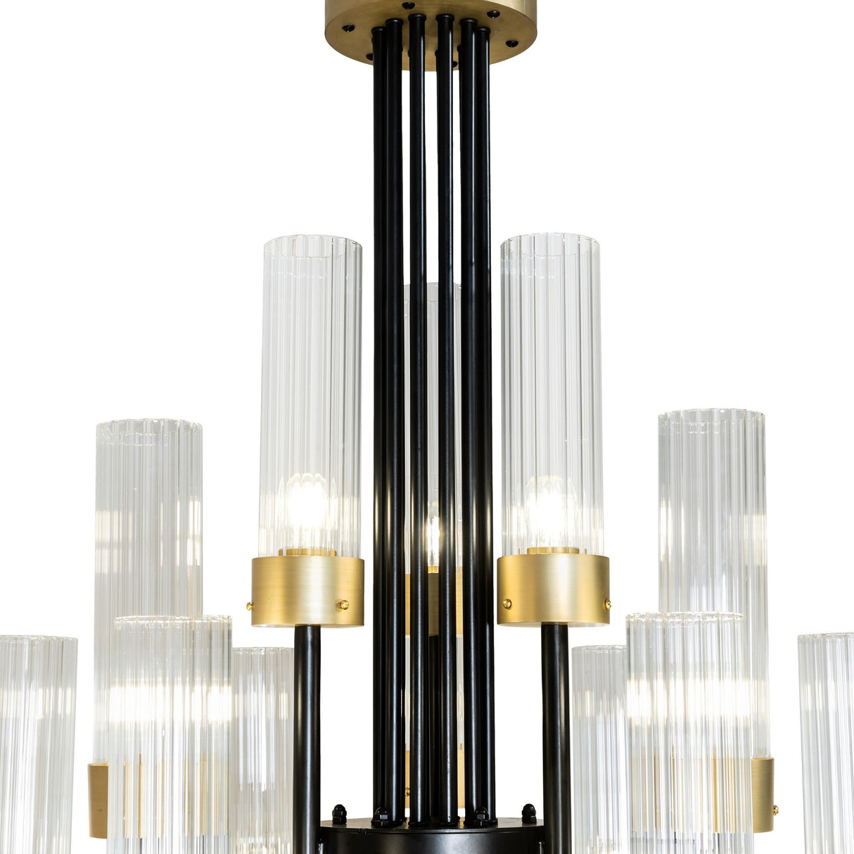 Detailed closeup of fluted glass cylinder shades on Kahler chandelier.