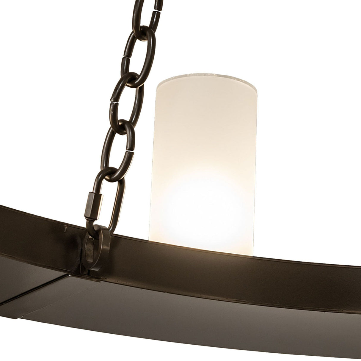 Close-up of chain connection and glass shade on chandelier ring frame.