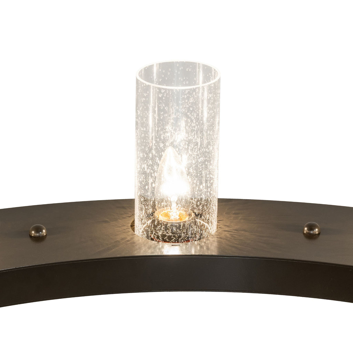 Close-up of lit glass shade on Loxley chandelier ring.
