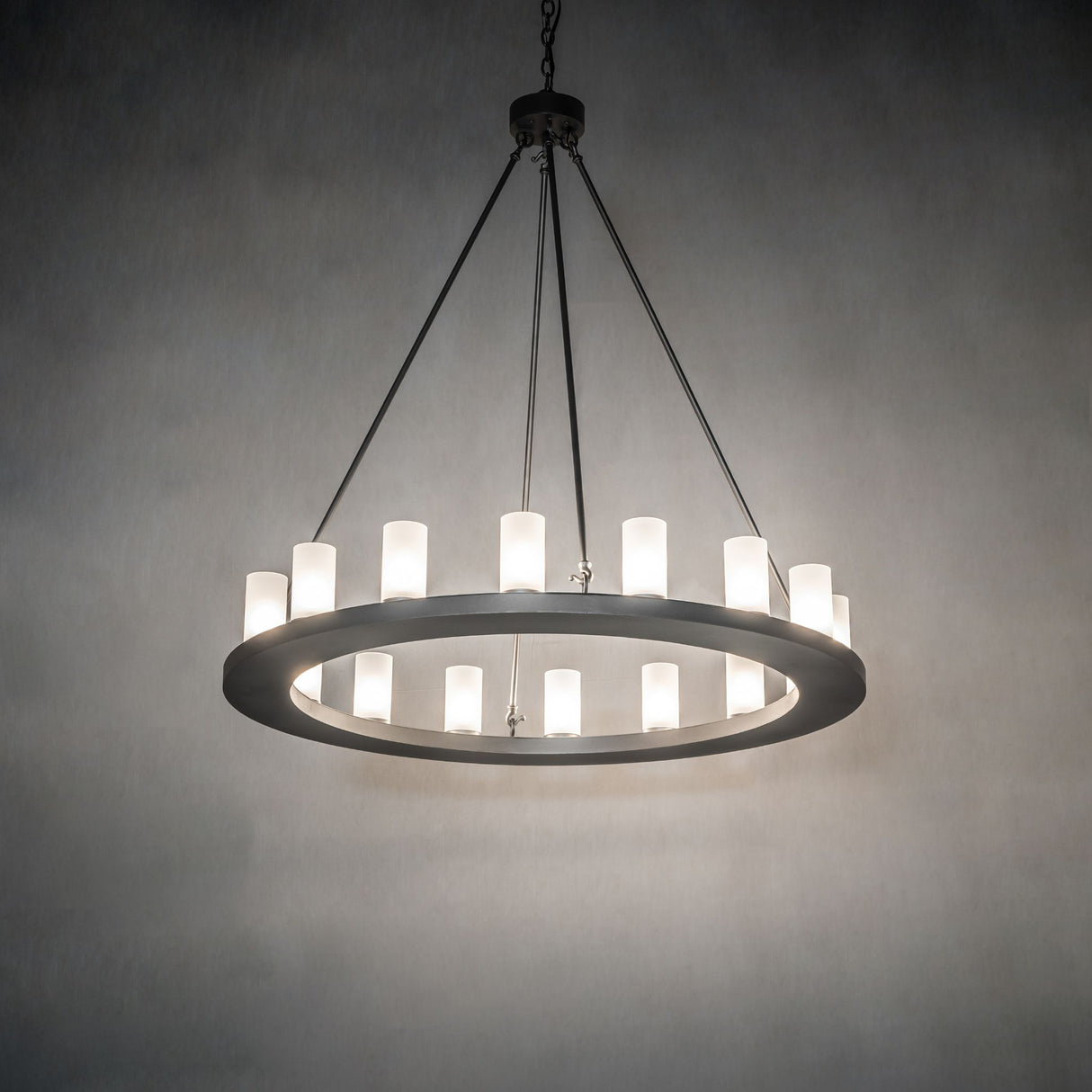 Loxley 16 light chandelier illuminated in an ambient room setting.