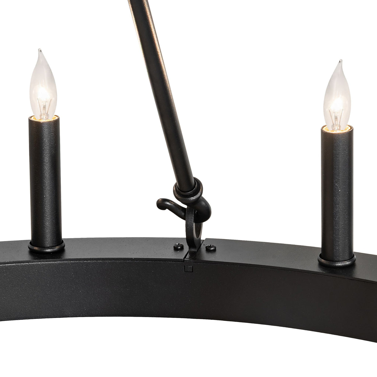 Close-up of candle-style light on ring chandelier and rod connection.