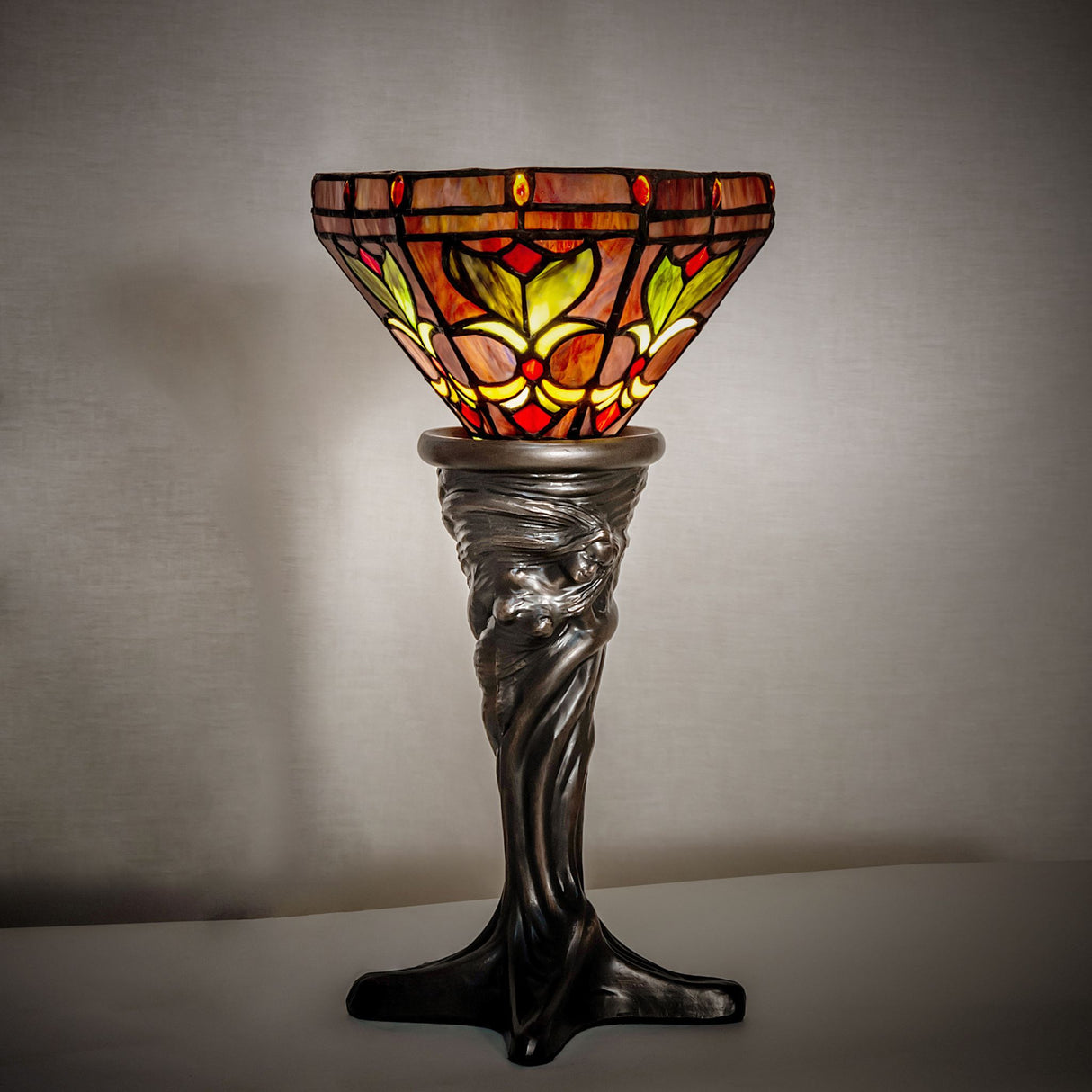 Middleton Mini Lamp creating a warm ambient light in a room.