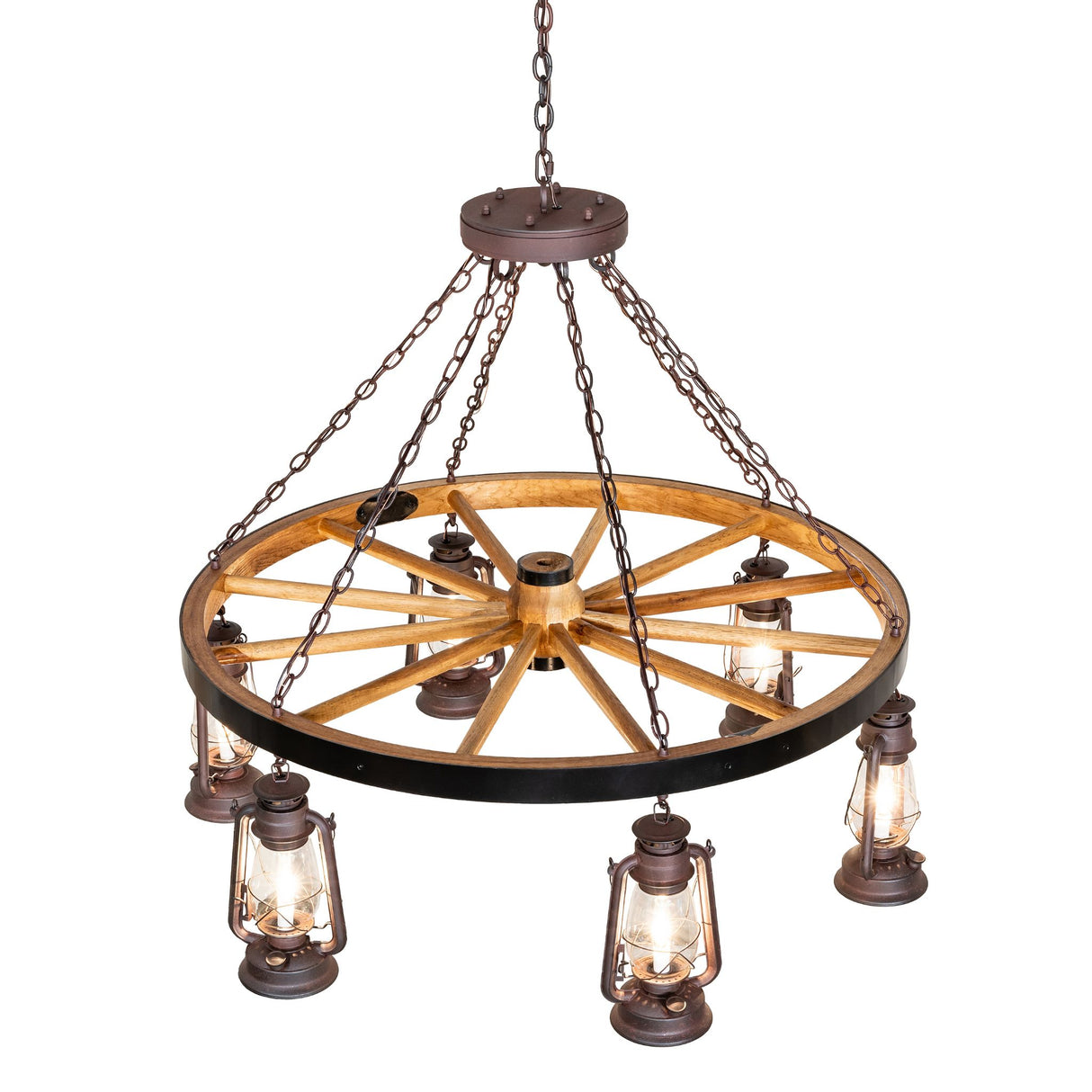 Angled view of wagon wheel chandelier with hanging lantern lights.