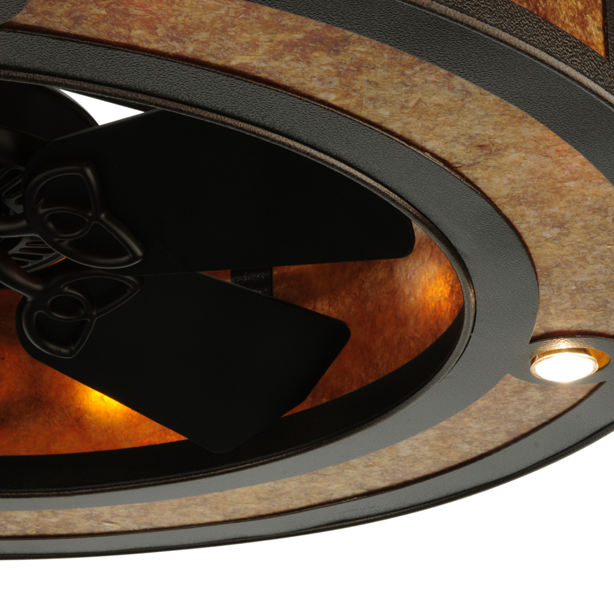 Close-up of mica diffuser with dark bronze frame pattern.