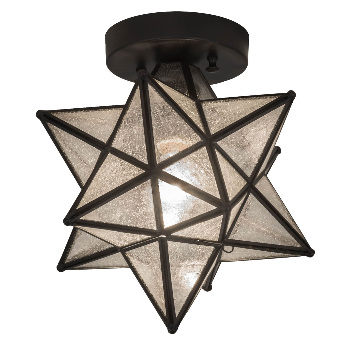Lit view of the Moravian Star Flushmount, featuring clear seeded glass panels.