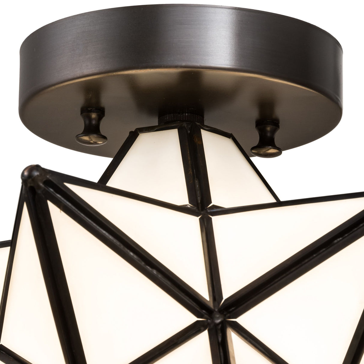 Close-up of the mounting hardware for the Moravian Star Flushmount in Craftsman Brown.