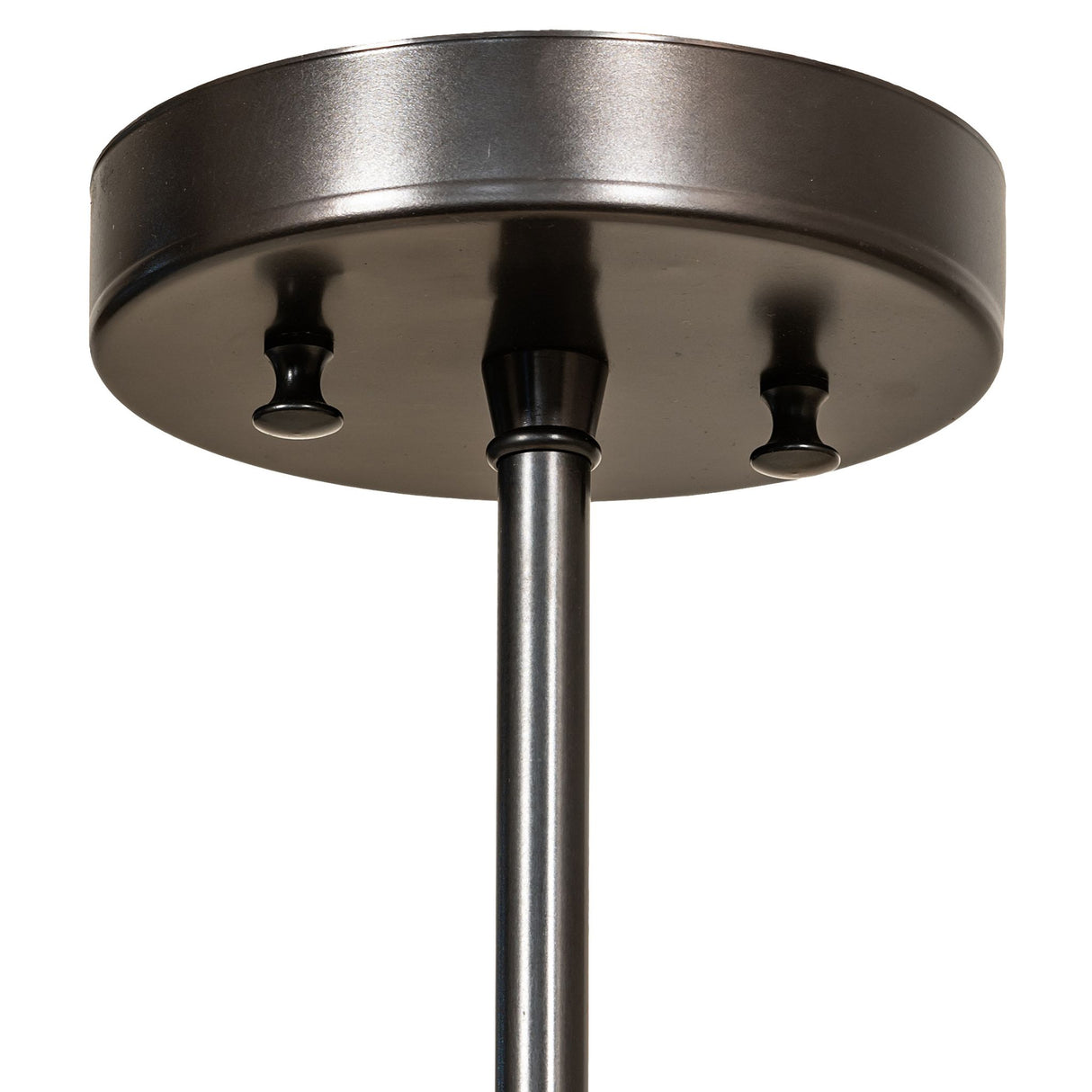 Close-up of the pendant's ceiling mount and metal hardware.