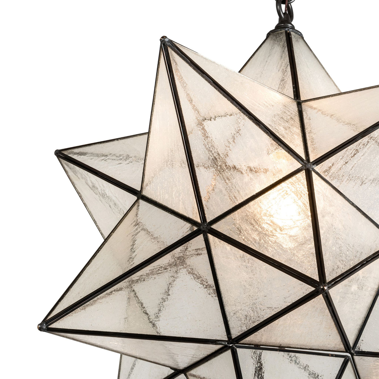 Close-up detail of the Moravian Star pendant showcasing its handcrafted brass frame.