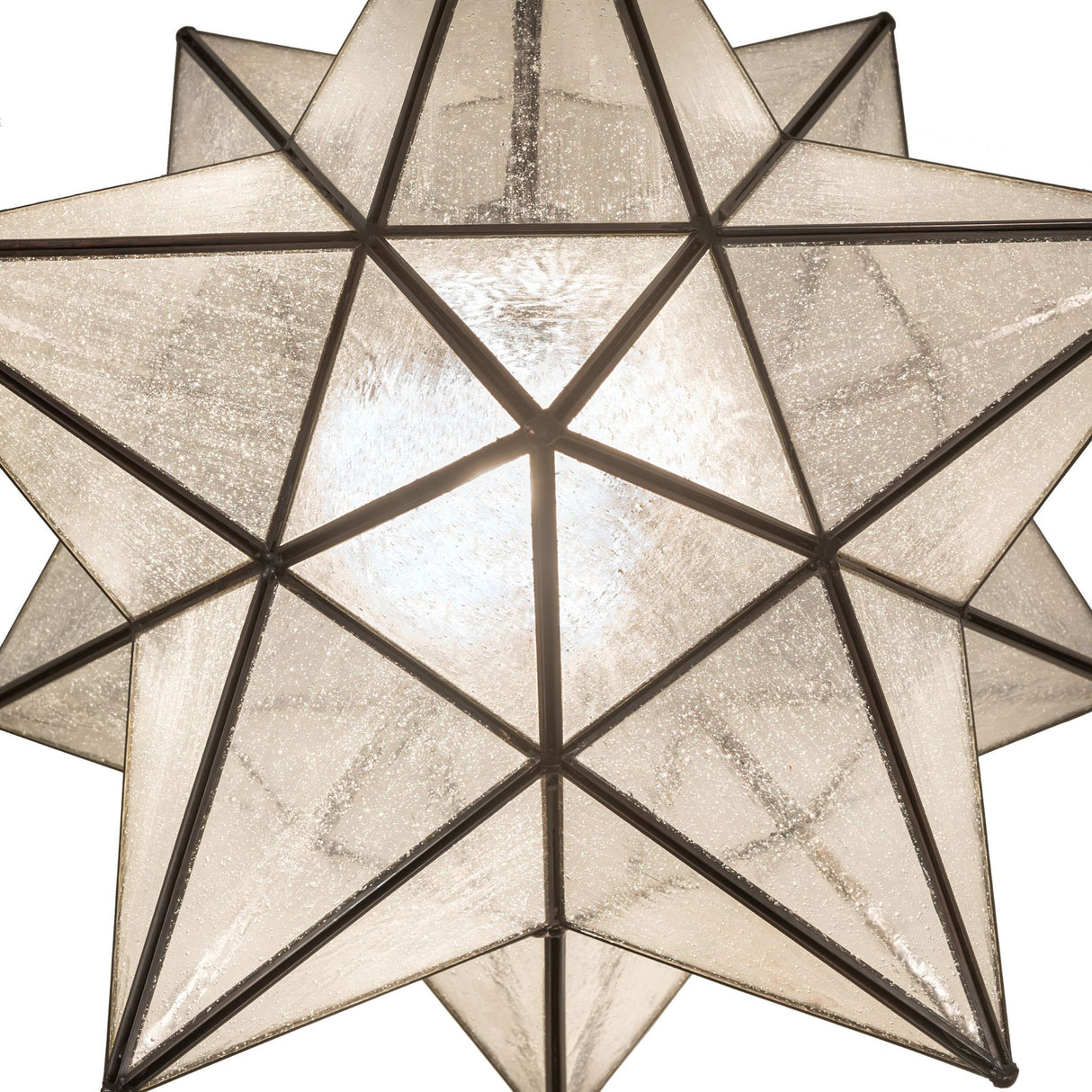 Detailed look at the textured seeded glass of the Moravian star semi-flushmount.