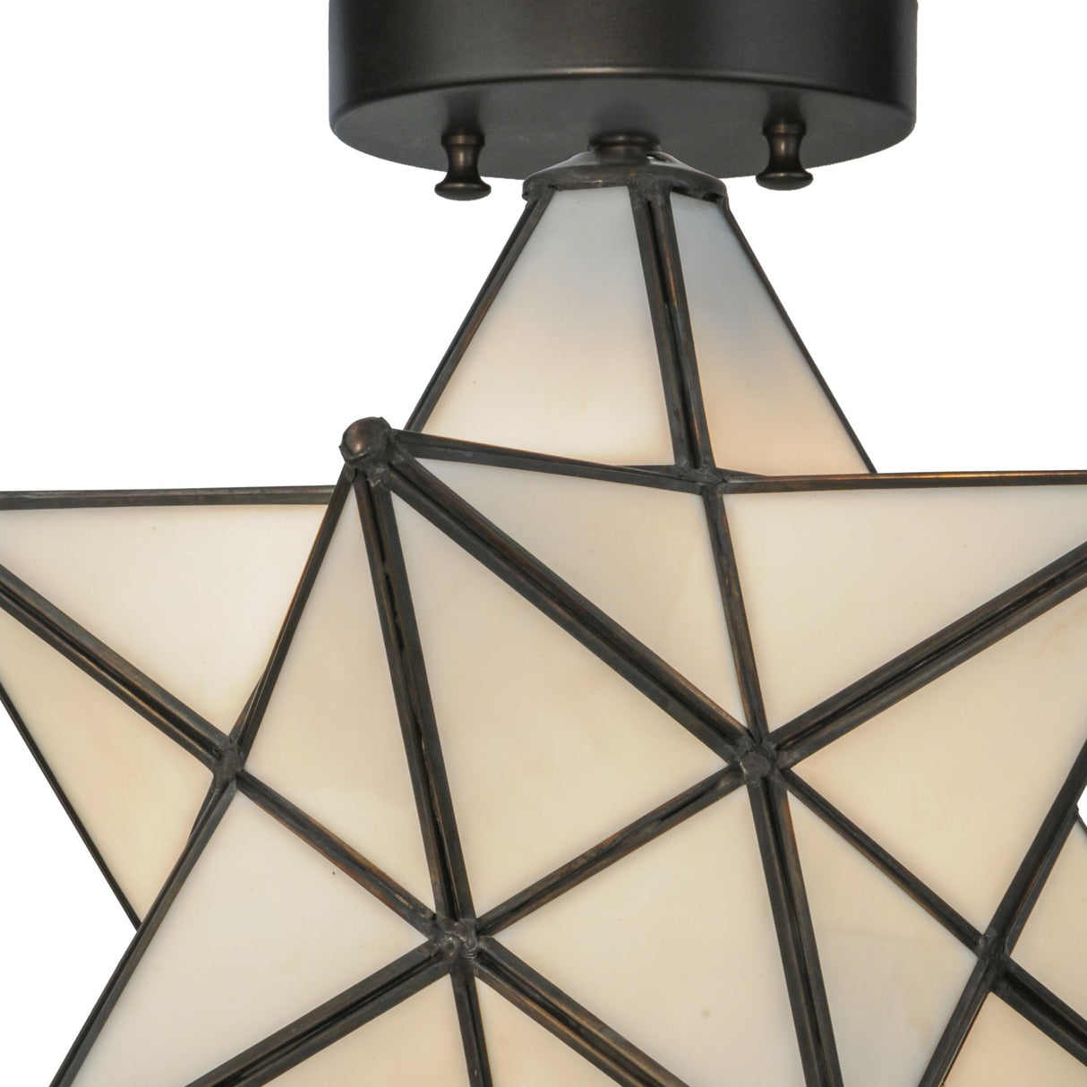 Close-up of Star White Flushmount, highlighting its handcrafted geometric glass and metal details.