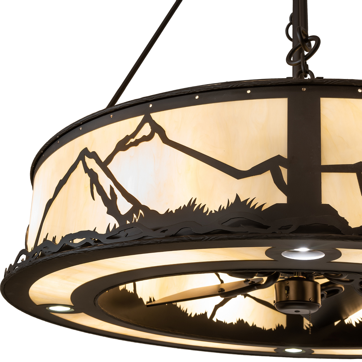 Close-up detail of mountain silhouette and softly illuminated Idalight shade.