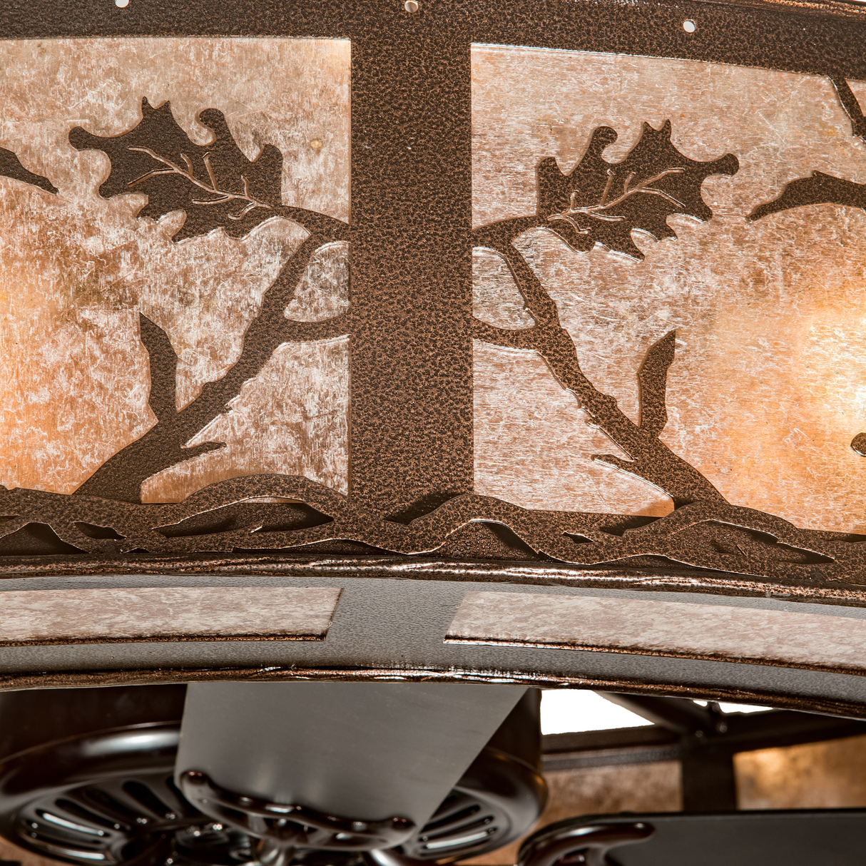 Close-up showing textured Copper Vein metal finish and lighted frame.