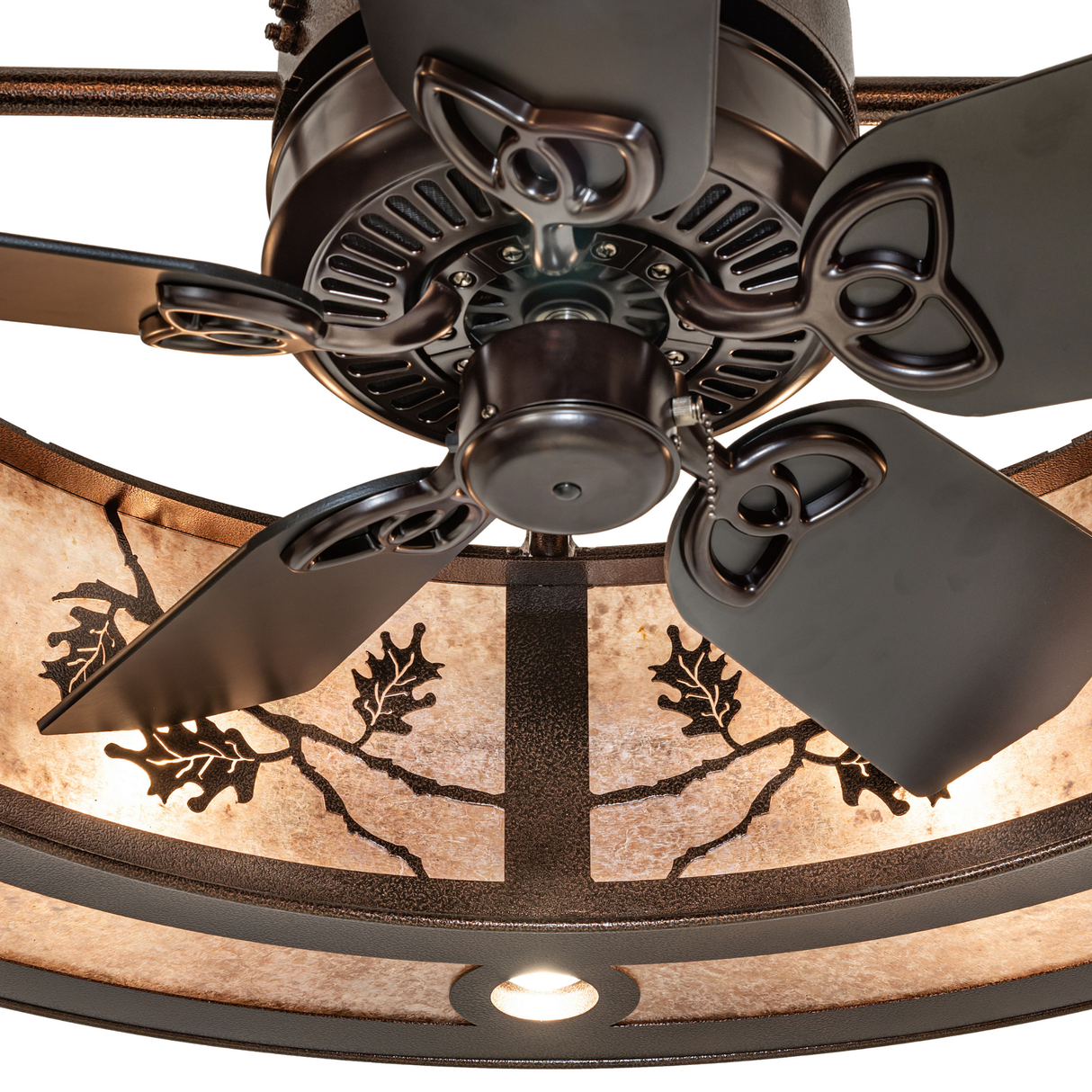 Closeup of the fan hub and blades with oak leaf pattern background.