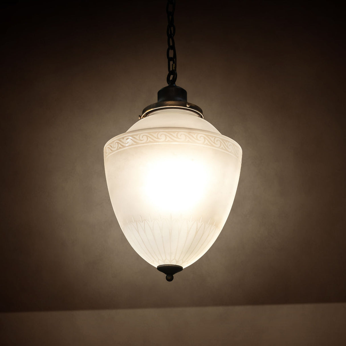 Illuminated Ovum Aquinum pendant on display.