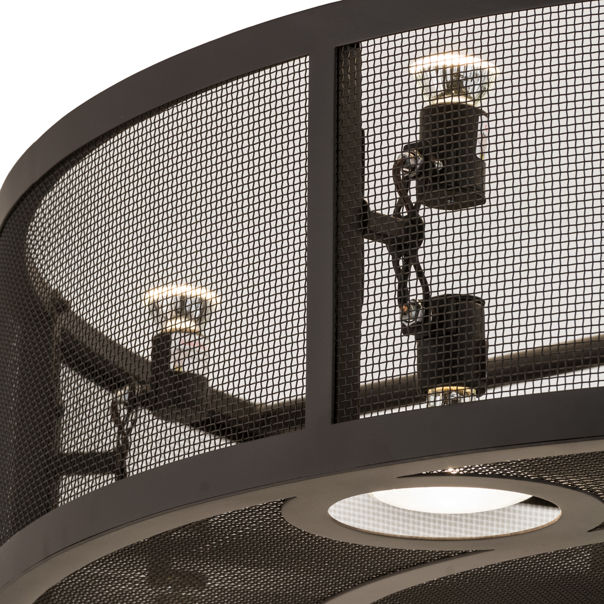 Closeup detail of mesh grid and light socket hardware finish.