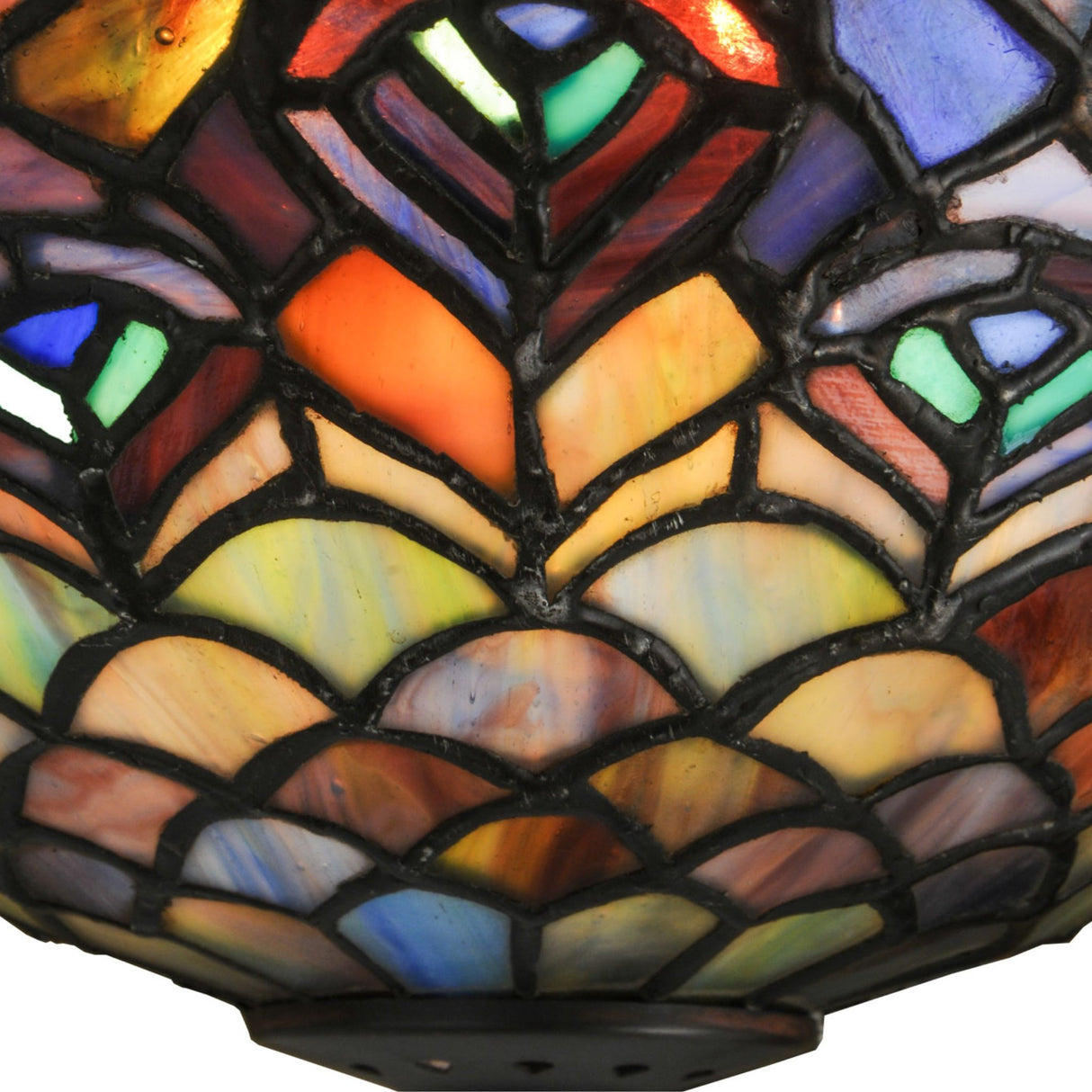 Detailed look at the Peacock Feather Wall Sconce showing intricate design patterns.