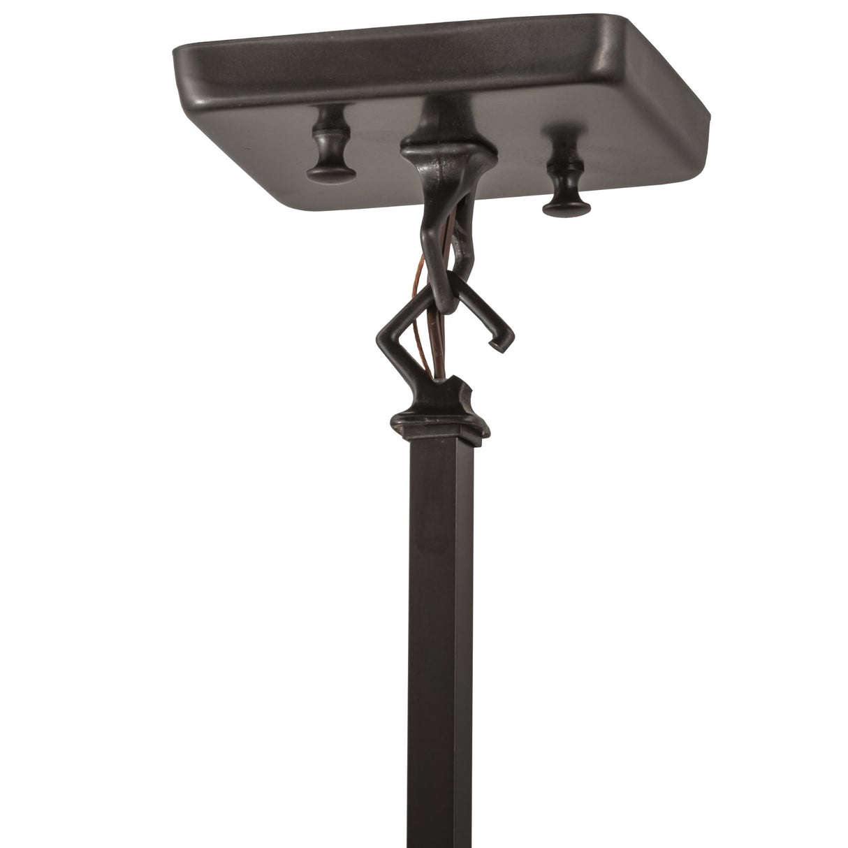 Close-up view of pendant hardware’s ceiling mount and wiring.