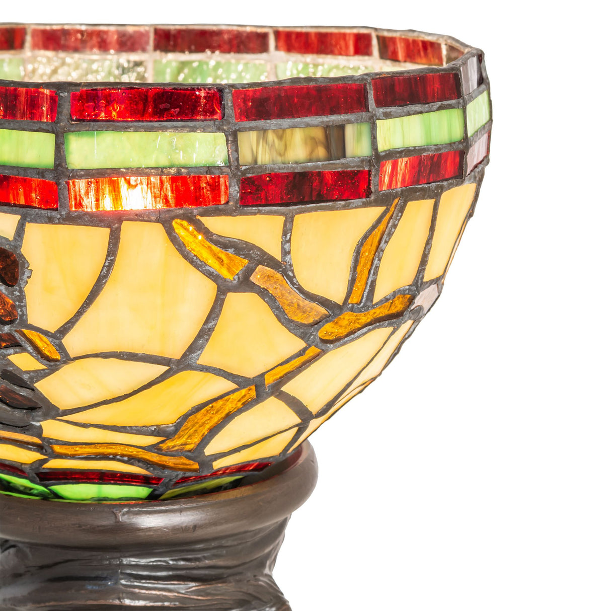 Close-up of the Lamp shade with intricate pinecone patterns and vibrant stained glass hues.