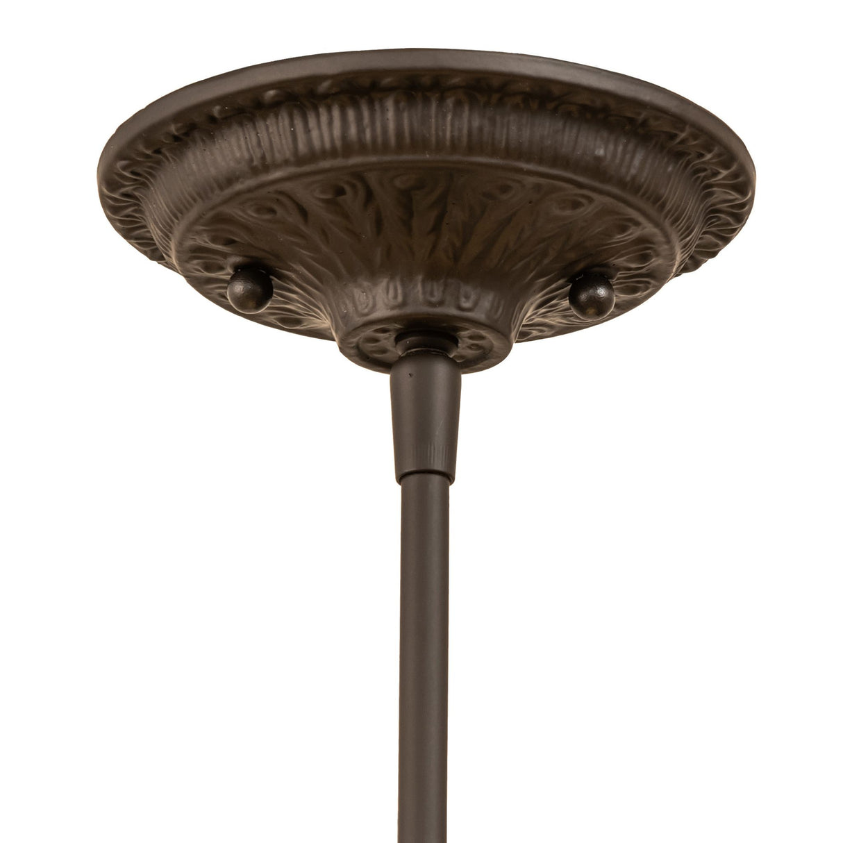 Close-up of the ceiling mount of the Pinecone mini pendant with intricate cast metalwork.