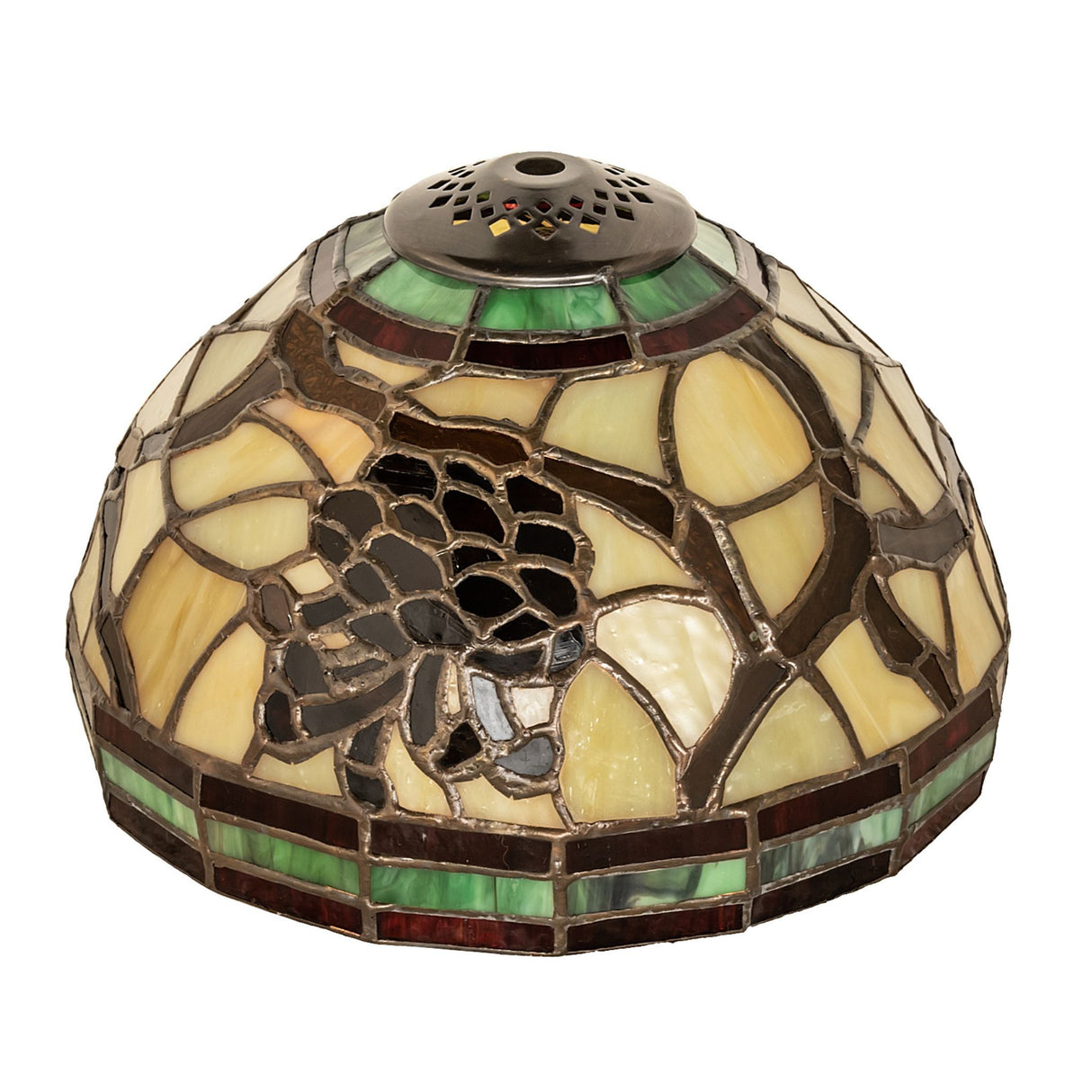 The unlit view of the stained glass shade with intricate pinecone design and natural color tones.