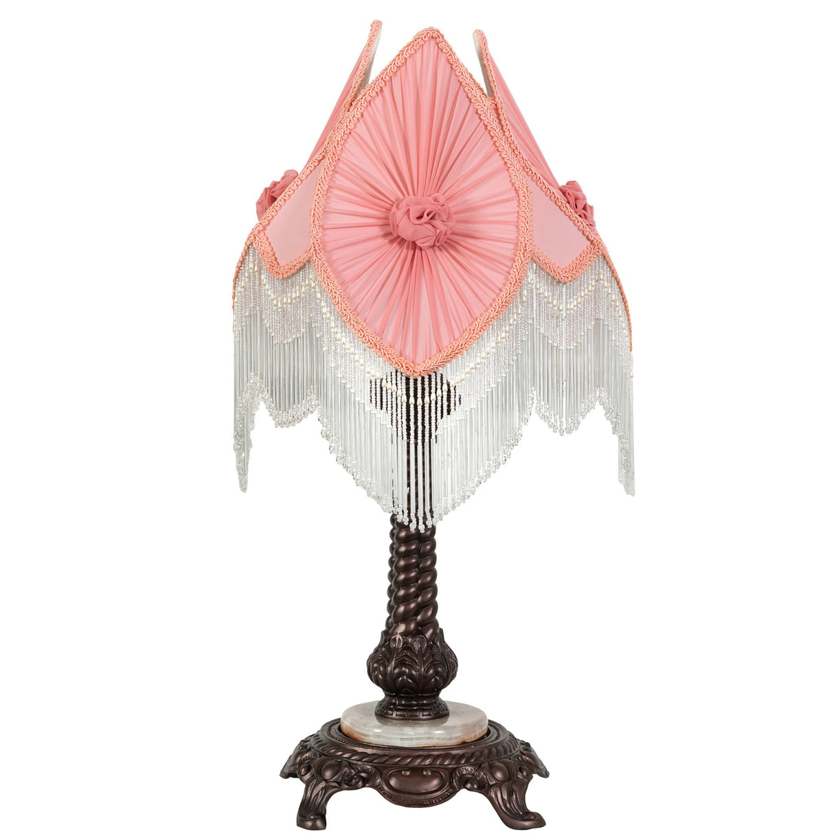 Pink fabric lampshade with fringe detailing and ornate bronze base.