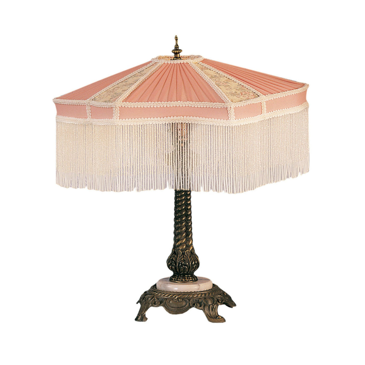 Single Persian table lamp with a pink fabric shade, intricate fringe detailing, and an antique-style metal base.