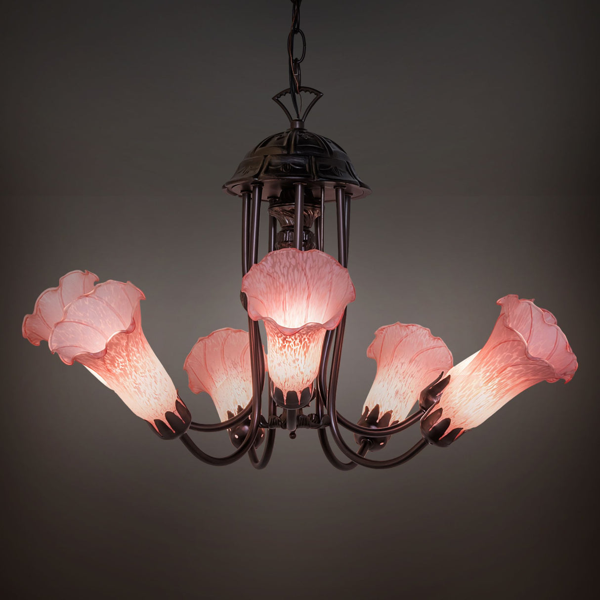 Illuminated view of the Pond Lily Chandelier showcasing the glowing pink shades.