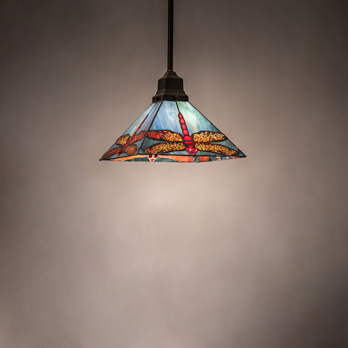 Prairie Dragonfly Mini Pendant glowing with ambient light.