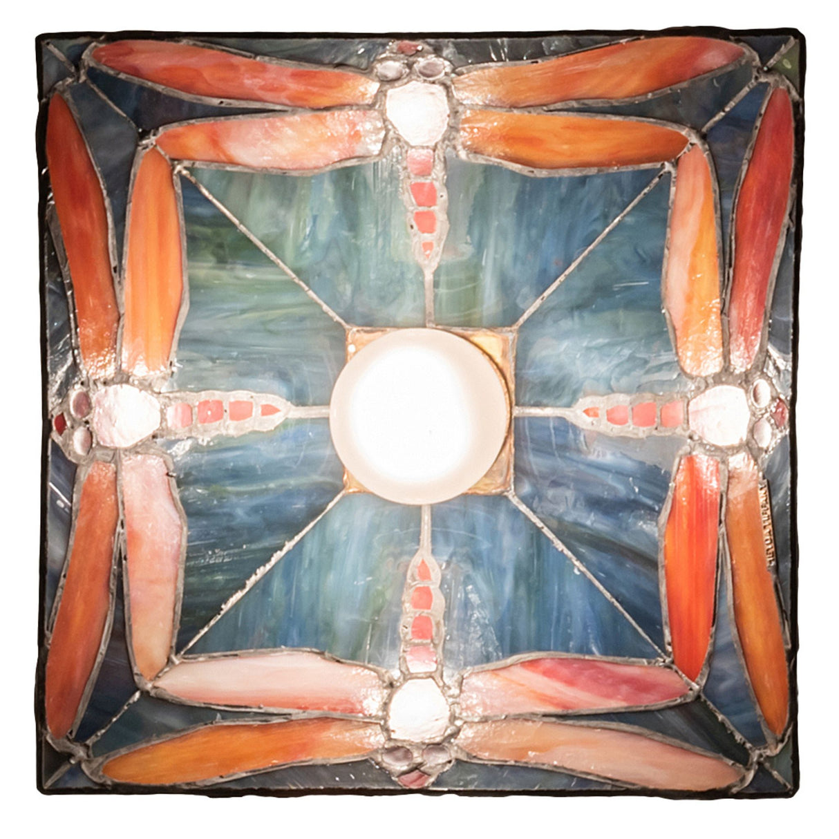 Illuminated bottom view showing vibrant glass details of the pendant.