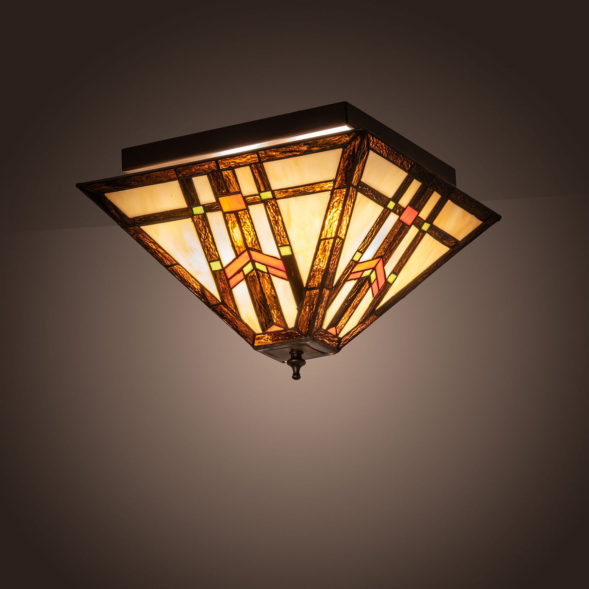Illuminated Prairie Wheat Flushmount showcasing warm, colorful glass patterns.