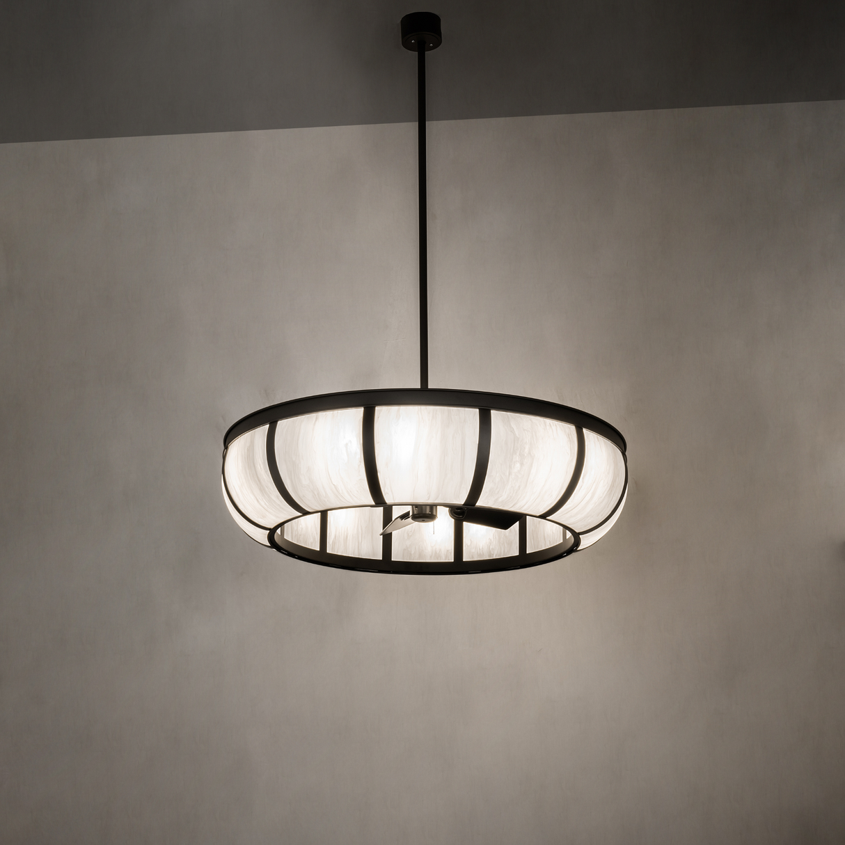 Prime Dome Chandel-Air softly illuminated in modern room setting.