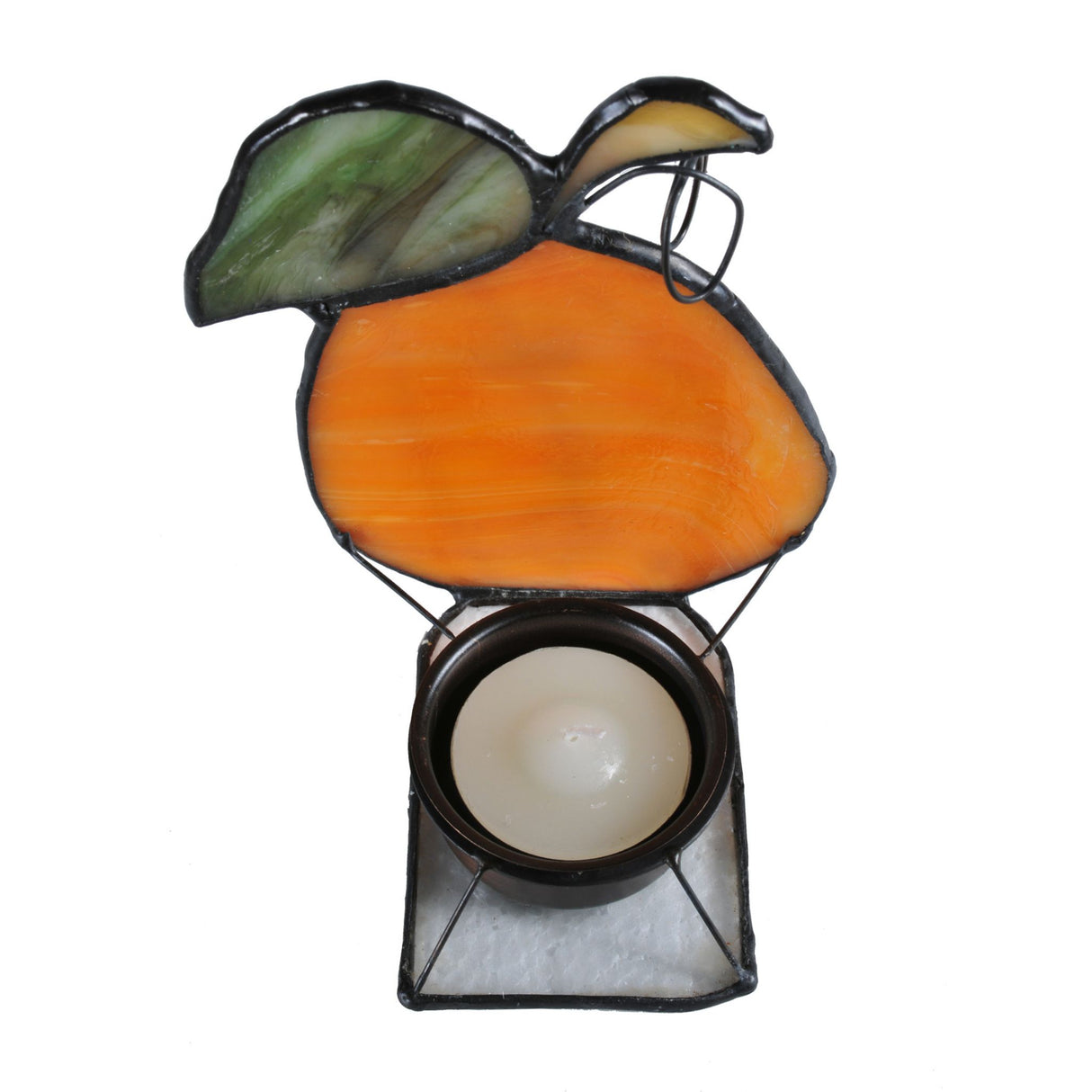 Top view of stained glass pumpkin tea light holder with candle.