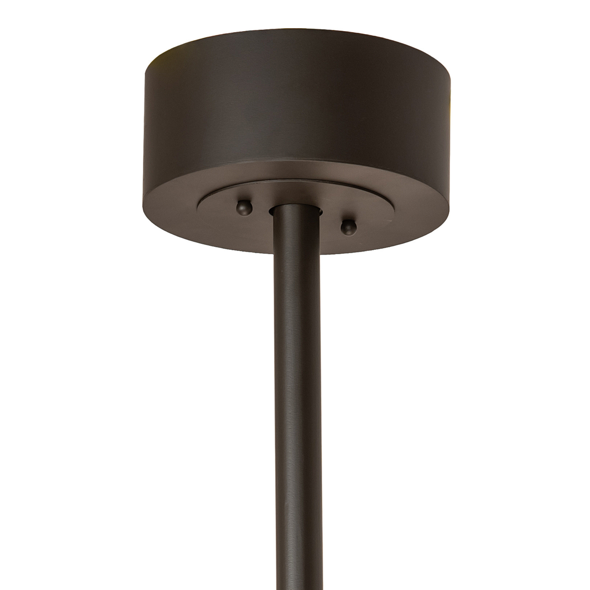 Bronze ceiling canopy and downrod detail in smooth metallic finish.