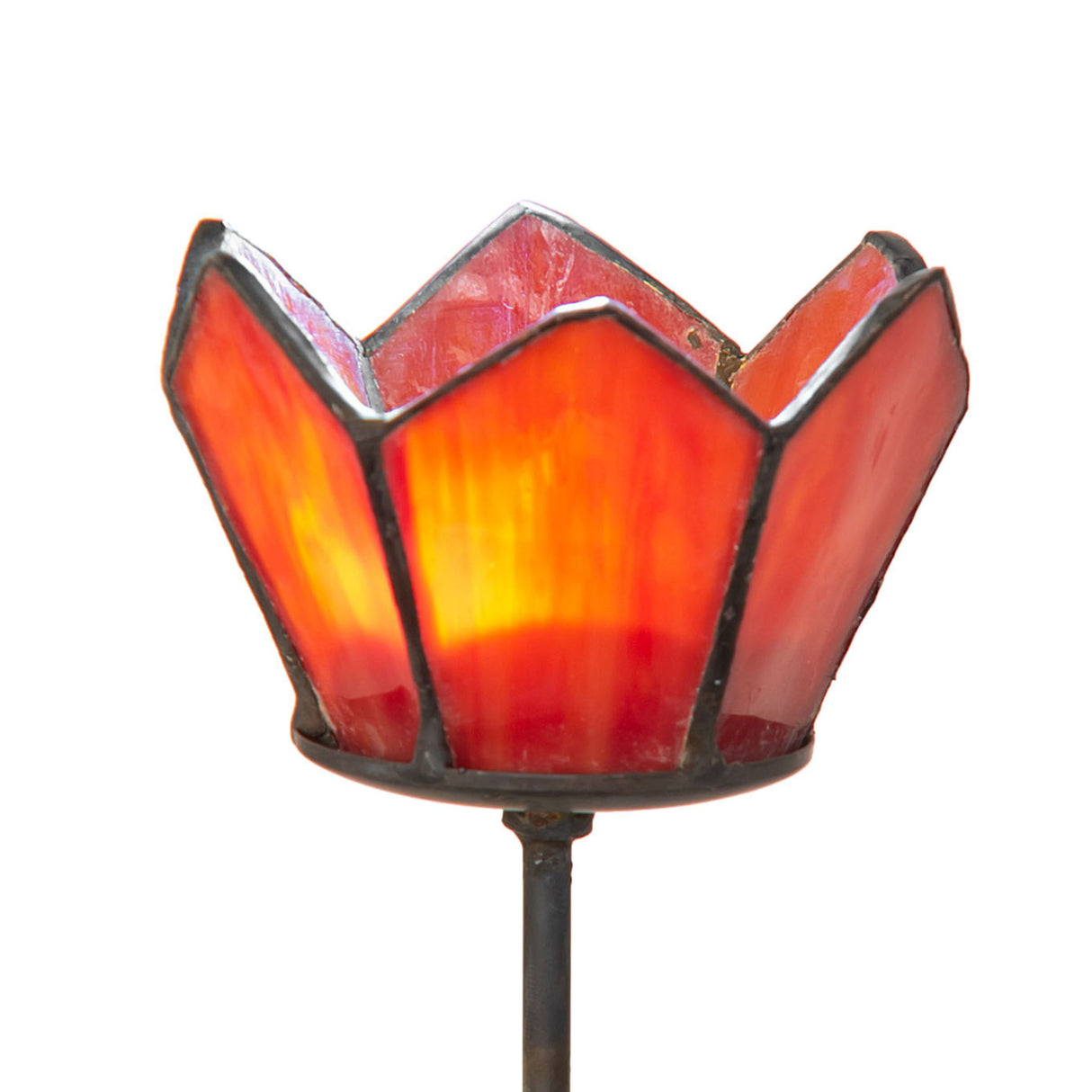 Close-up of the Radiant Blossom Tealight Holder, focusing on the vibrant stained glass floral petals.