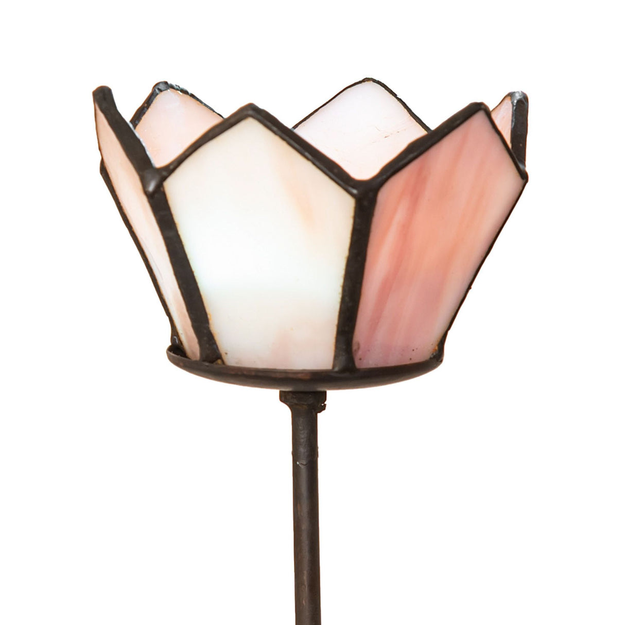 Closeup of stained glass blossom shade in pink and white.