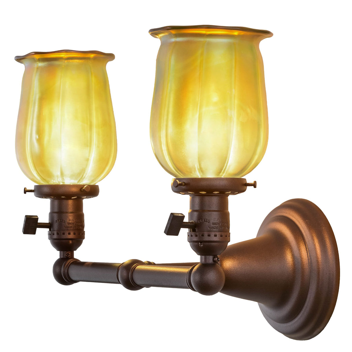 Side-lit view of the Revival Chelsea Favrile wall sconce featuring dual Gold Iridescent glass shades.