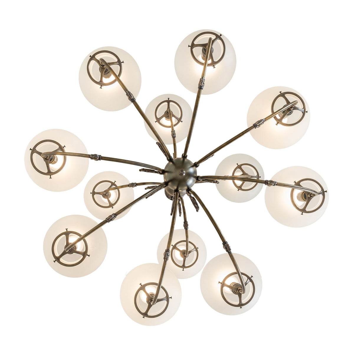 Bottom view of Revival chandelier displaying circular arm pattern and glass globes.