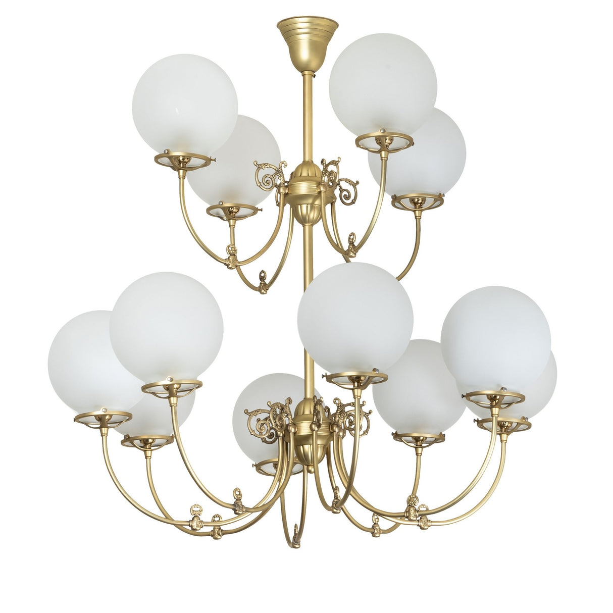 Polished brass revival chandelier with frosted globe shades, unlit.