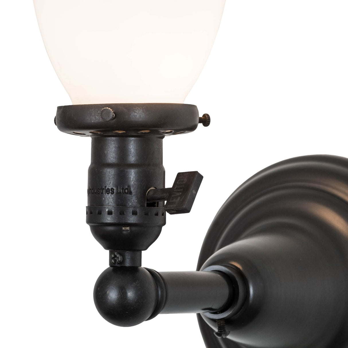 Closeup of the Revival Goblet Wall Sconce highlighting the opal white goblet shade and craftsmanship.