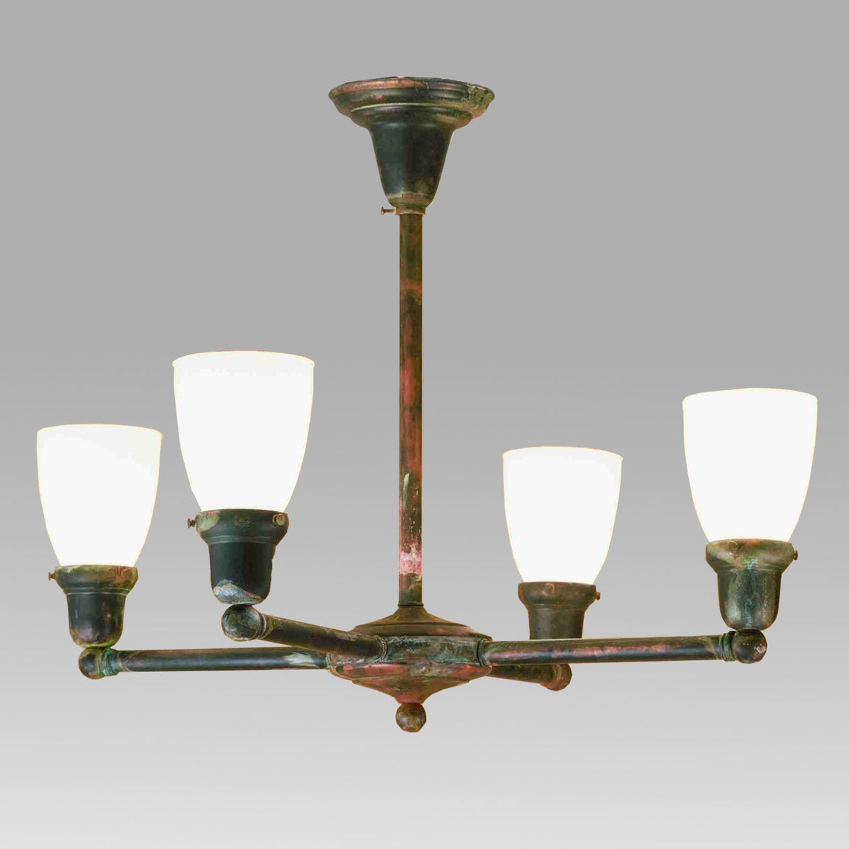 Vintage copper chandelier with opal white goblet glass shades.