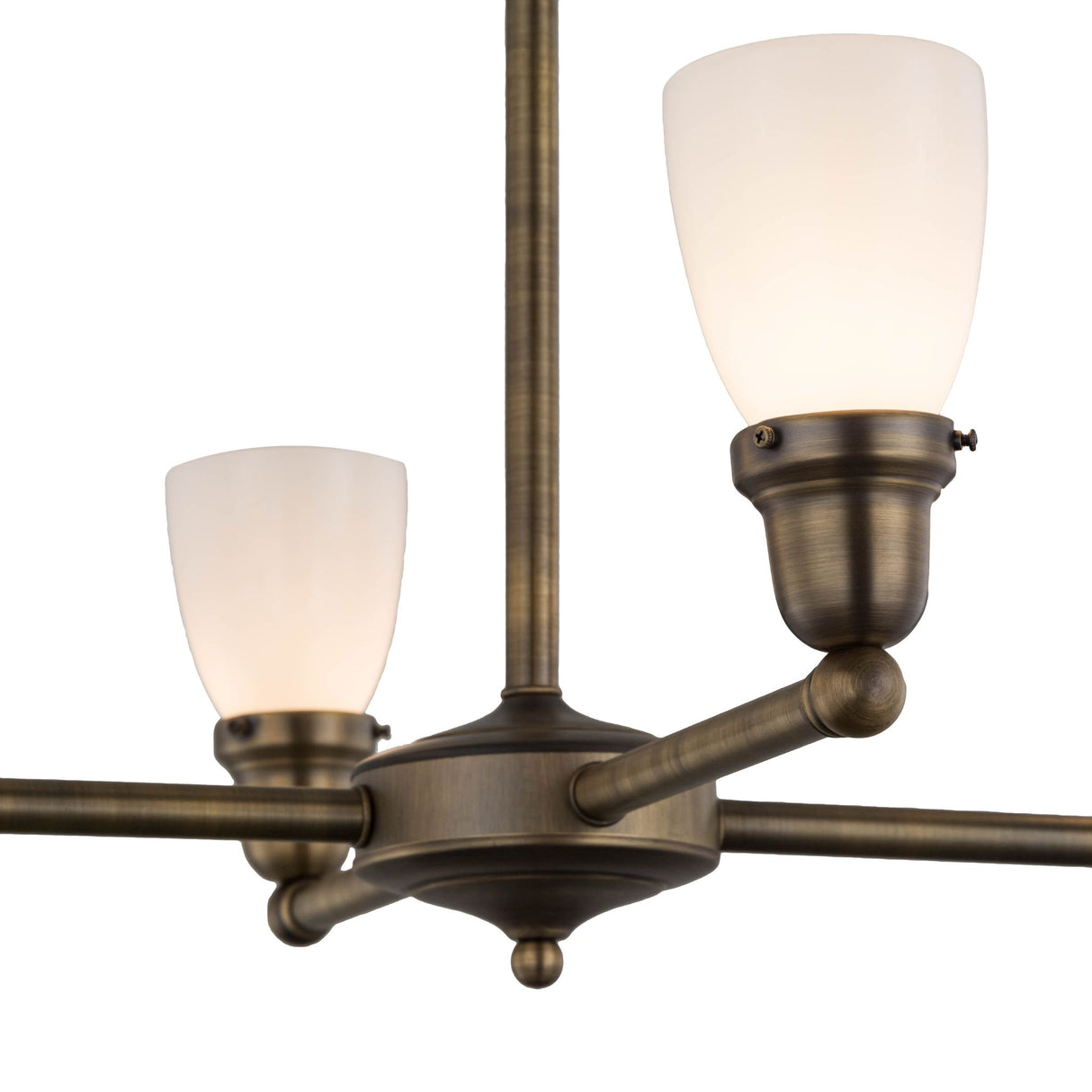 Antique white glass goblet shade with brass fixture holder.