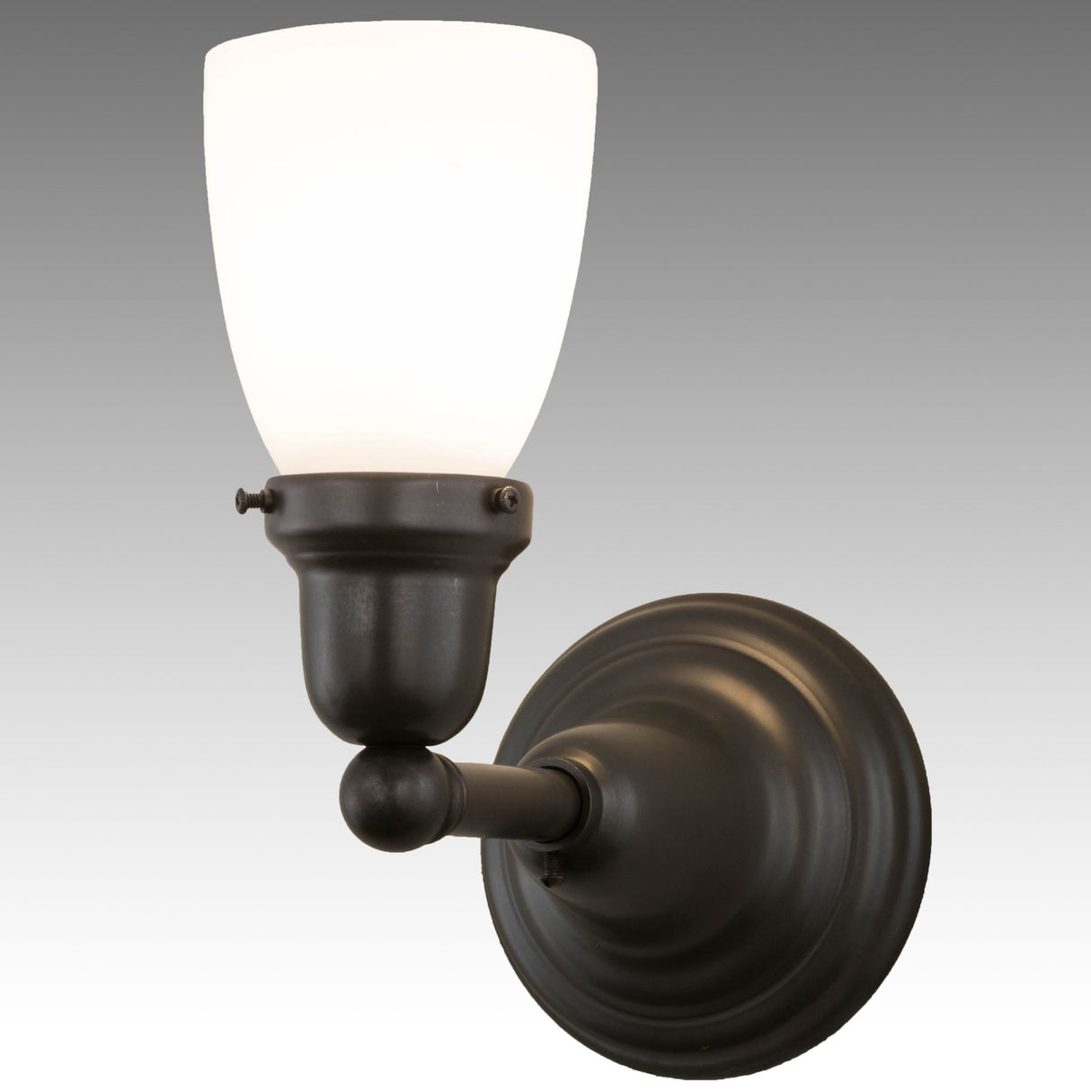 Lit view of Opal White blown-glass shade and Craftsman Brown brass hardware.