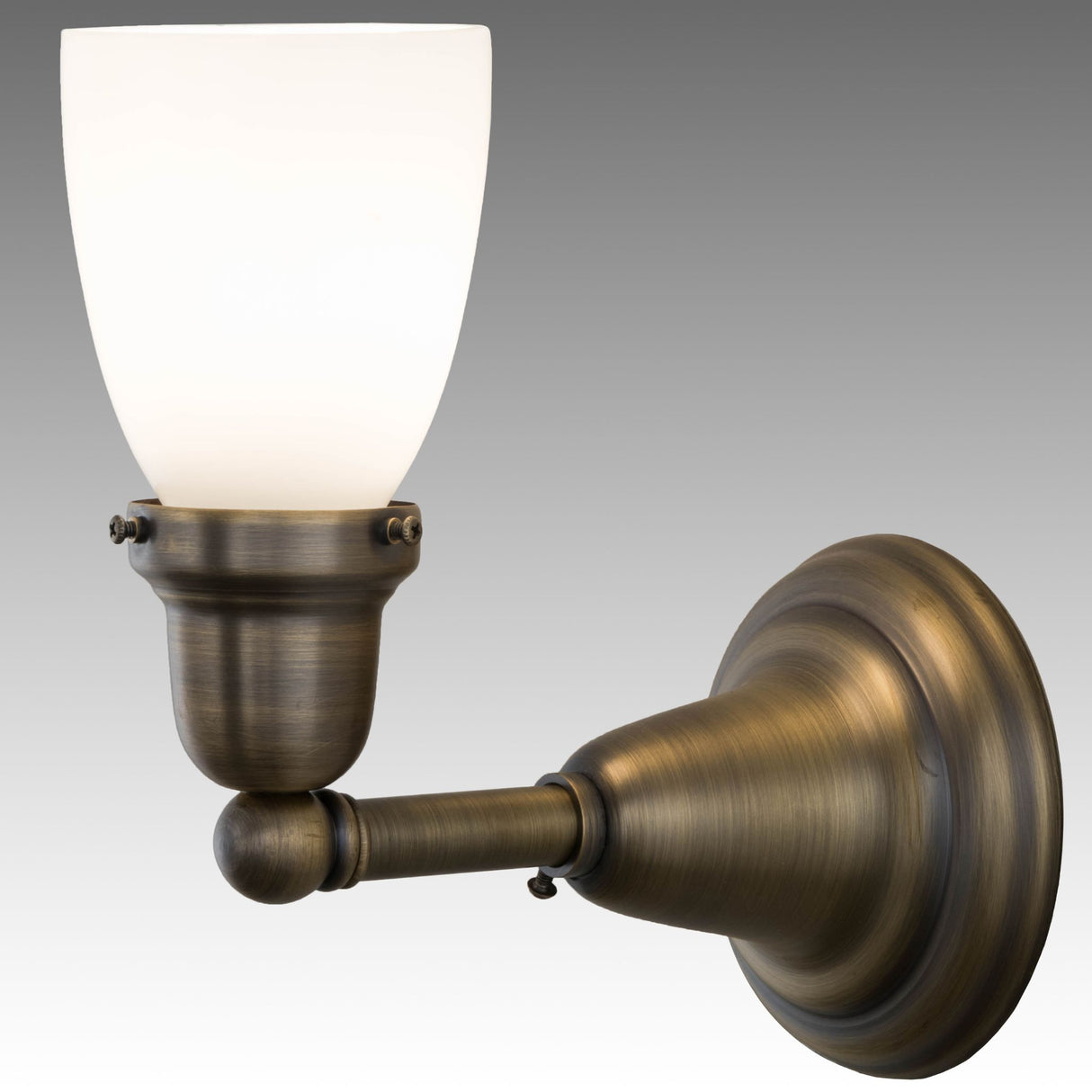 Side angle of the Wall Sconce displaying its curved brass hardware.