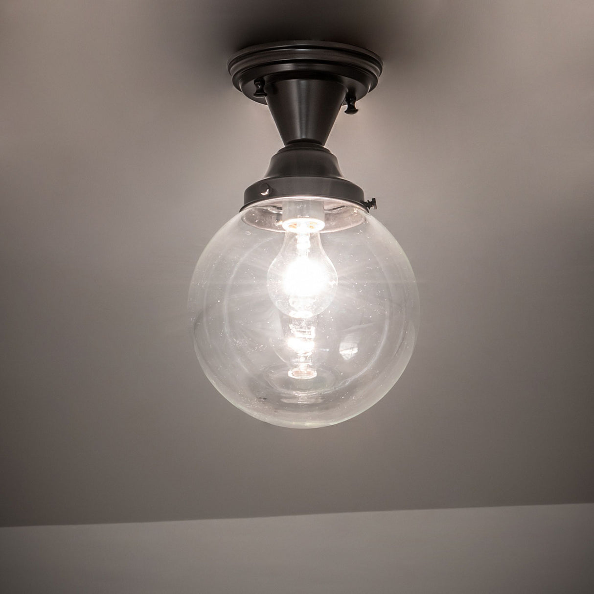 Revival Schoolhouse semi-flushmount casting soft ambient lighting.